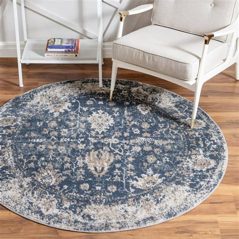 Curvy furniture or circular objects naturally fit into a round rug motif. . 3 ft round rug